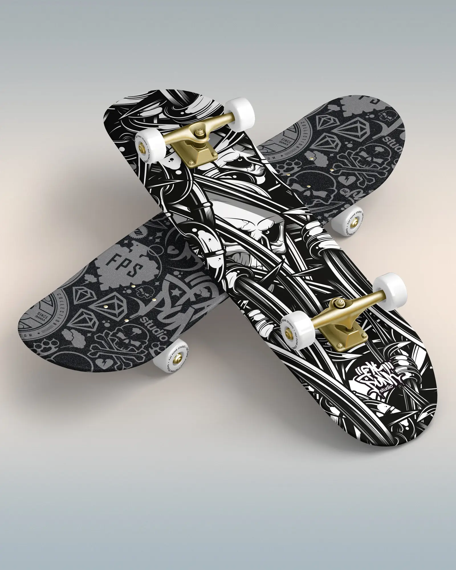 Two skateboards with ornate black and white design placed in an x formation, with a skull and barbed wire design, on a light gray background.